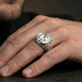 Load image into Gallery viewer, Polished silver Good Shepherd signet ring worn on finger, oval Jesus and lamb engraving with clean shine and bold signet profile
