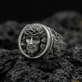 Load image into Gallery viewer, Oxidized 925 sterling silver Jesus ring on volcanic rock, crown of thorns portrait relief with deep antiqued shadows
