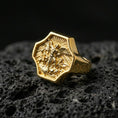 Load image into Gallery viewer, Gold plated Saint Michael ring on dark volcanic rock, Archangel warrior slaying dragon with engraved “SAINT” side text
