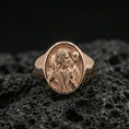Load image into Gallery viewer, Rose gold plated Good Shepherd ring on volcanic stone, Jesus carrying lamb signet with smooth oval bezel
