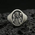 Load image into Gallery viewer, Oxidized 925 sterling silver Jesus Good Shepherd signet ring on volcanic rock, Christ carrying lamb relief face
