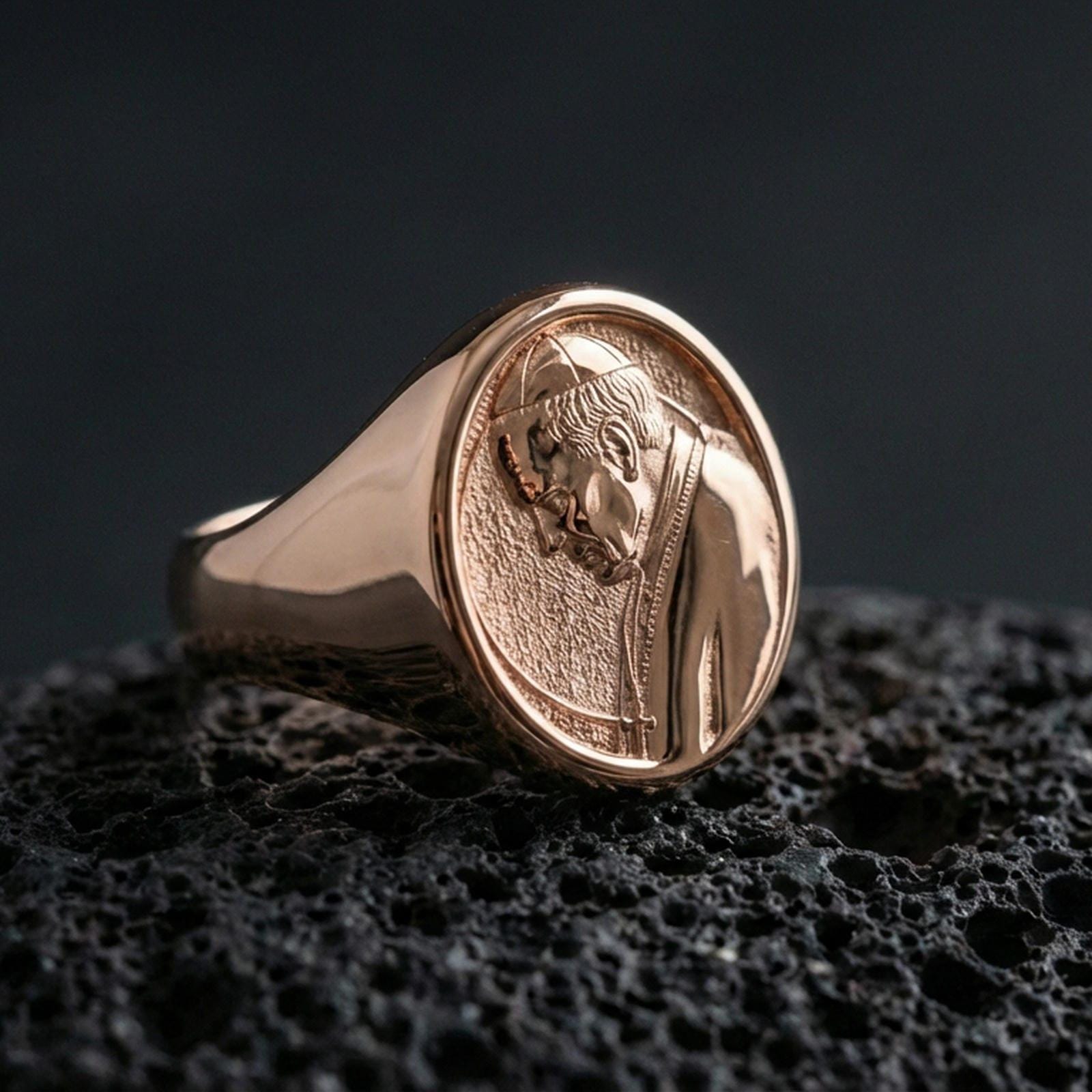 Rose gold plated Pope portrait ring on volcanic stone, papal profile relief signet with rounded oval frame