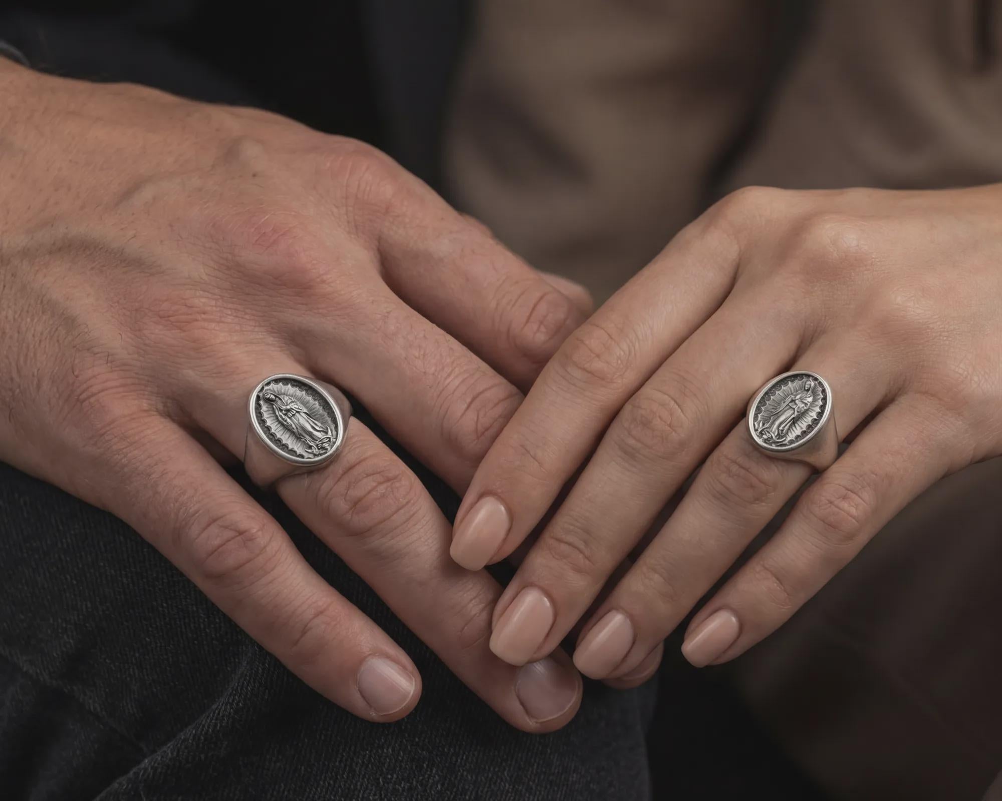 Oxidized sterling silver Our Lady of Guadalupe signet ring worn on male hand as religious jewelry