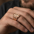 Load image into Gallery viewer, Rose gold plated Saint Dominic ring worn on finger, religious saint portrait signet with cross motif shoulder
