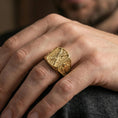 Load image into Gallery viewer, Gold plated Saint Andrew ring worn on finger, saint engraving with cross band side panel
