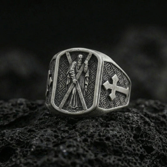 Oxidized 925 sterling silver Saint Andrew ring on volcanic rock, apostle holding cross with cross motif side panel