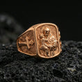 Load image into Gallery viewer, Rose gold plated Saint Anthony signet ring on dark volcanic stone, saint and Child Jesus engraving with cross side panel
