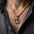 Load image into Gallery viewer, Rose gold plated Mjölnir necklace worn on model with strong Nordic warrior style
