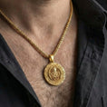 Load image into Gallery viewer, Gold plated Cthulhu pendant necklace worn by man as bold dark fantasy statement jewelry
