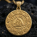 Load image into Gallery viewer, Gold plated Valknut pendant showcased on volcanic rock as a symbol of Odin, destiny, and warrior honor
