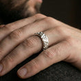 Load image into Gallery viewer, White gold Celtic eternity band ring worn on hand showing Irish knotwork details
