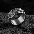 Load image into Gallery viewer, Oxidized geometric faceted band ring photographed on volcanic rock with sharp pyramid-cut texture and industrial masculine finish
