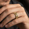 Load image into Gallery viewer, Gold plated woven wedding band worn by man as a bold textured classic with premium shine

