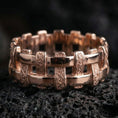 Load image into Gallery viewer, Rose gold plated wicker weave ring presented on volcanic rock surface with warm tone and handcrafted pattern detail
