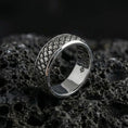 Load image into Gallery viewer, Polished silver Japanese cloud design wedding band displayed on volcanic stone, highlighting crisp scrollwork depth and clean reflective edges
