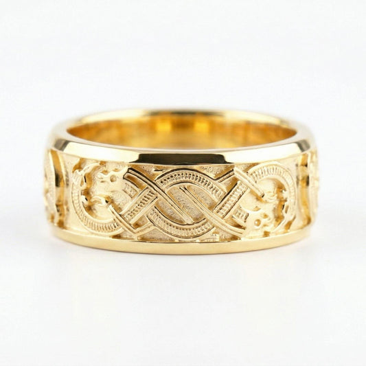 Gold Slavic dragon motif ring displayed on a white surface highlighting Celtic-style knot details and bold mythology aesthetic