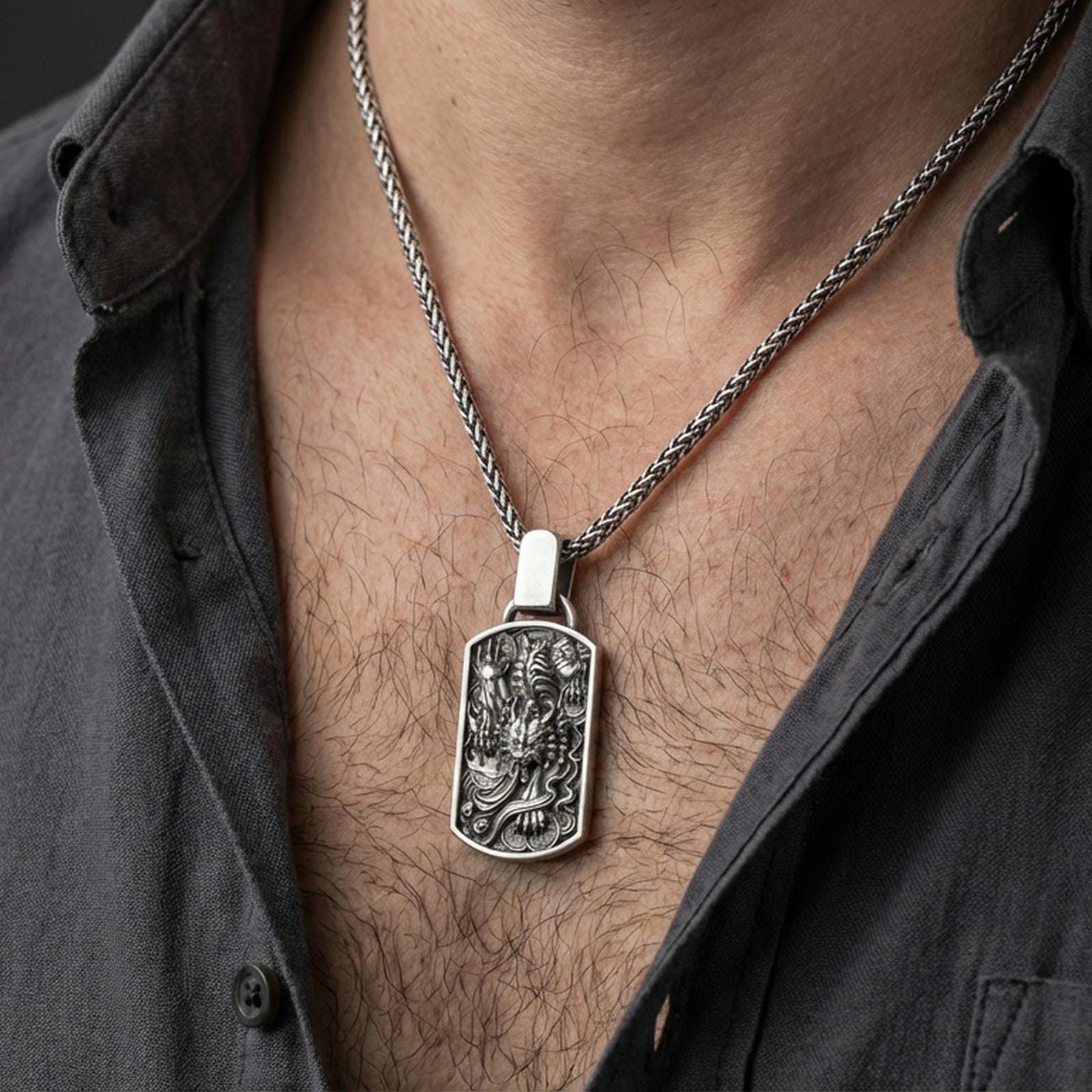 Oxidized 925 sterling silver foo dog pendant worn on neck, Chinese guardian lion dog tag necklace on braided chain