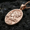 Load image into Gallery viewer, Rose gold plated Persephone pendant on dark volcanic stone, Greek goddess profile oval medallion necklace with pomegranate motif
