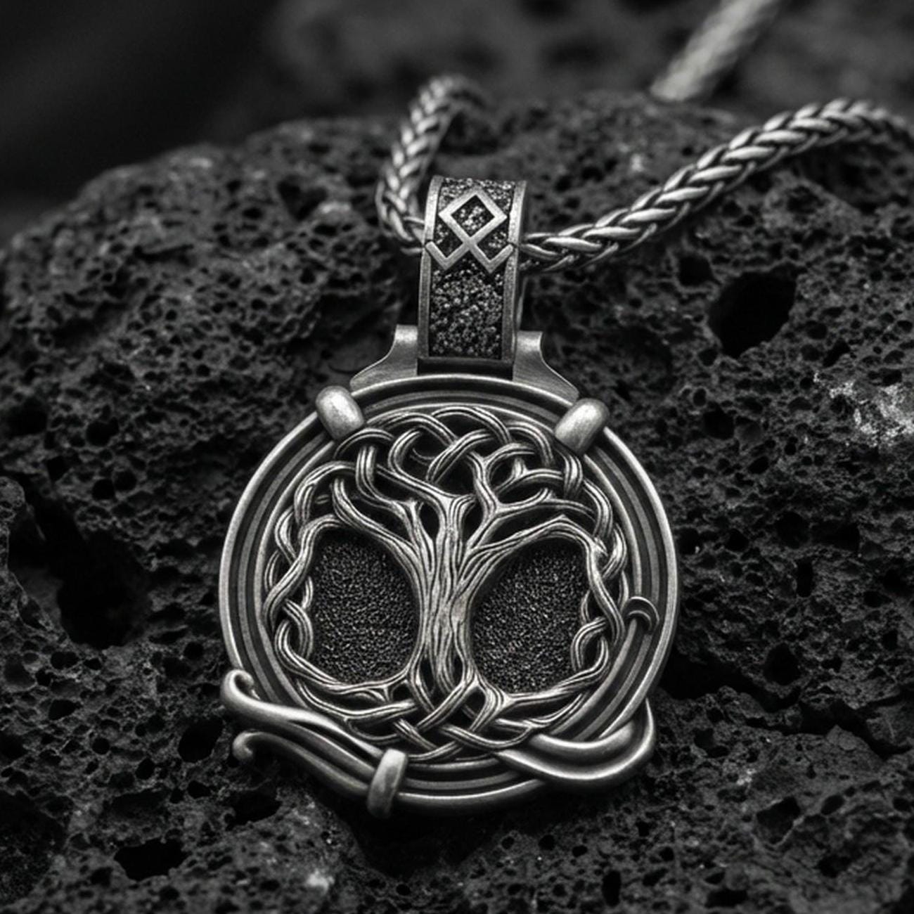 Oxidized 925 sterling silver yggdrasil tree of life pendant on volcanic rock, norse viking knotwork medallion necklace
