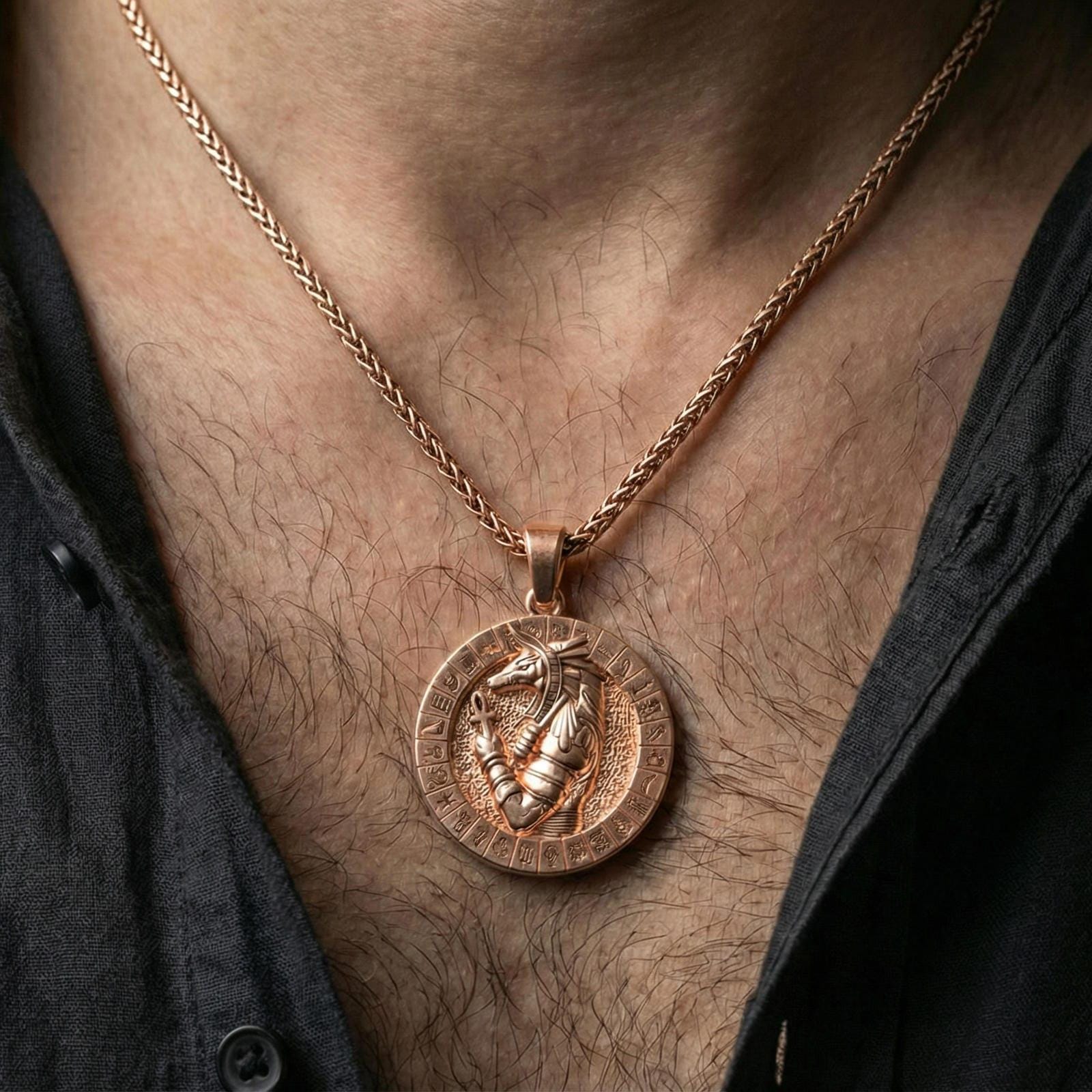 Rose gold plated Anubis necklace worn on neck, Egyptian Anubis talisman pendant with engraved symbol frame