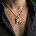 Load image into Gallery viewer, Rose gold plated lamassu necklace worn on neck, ancient Mesopotamian lamassu talisman pendant statement piece
