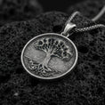 Load image into Gallery viewer, Oxidized 925 sterling silver Tree of Life coin pendant on volcanic rock, Celtic inspired roots and branches necklace
