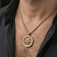Load image into Gallery viewer, Rose gold plated guardian lion medallion necklace worn on neck, lifestyle wear shot, warm plating tone and sculpt depth
