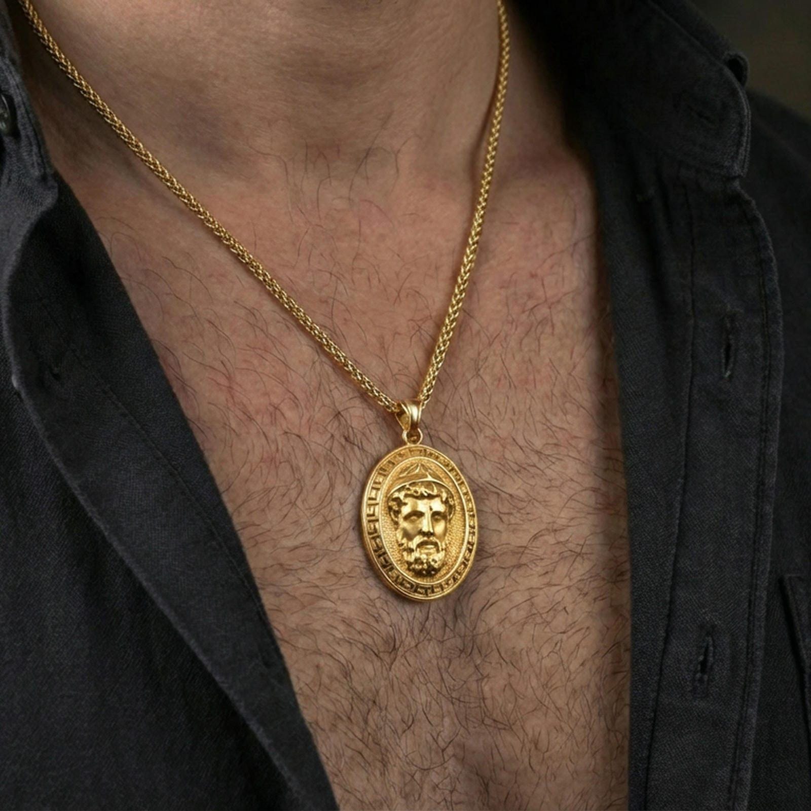 Gold plated Medusa pendant necklace worn on neck, premium styling, myth-inspired medallion as focal point