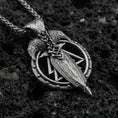 Load image into Gallery viewer, Oxidized sterling silver Odin’s spear and raven pendant on volcanic rock, Norse Viking talisman design, macro shot

