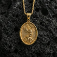 Load image into Gallery viewer, Gold plated phoenix bird pendant on volcanic rock, premium studio lighting, mythic rebirth talisman design
