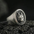 Load image into Gallery viewer, Oxidized sterling silver fox head signet ring on volcanic rock, round face with detailed fur texture, macro studio shot
