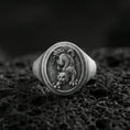 Load image into Gallery viewer, Oxidized sterling silver Asian tiger signet ring on volcanic rock, prowling tiger relief with textured background, macro shot
