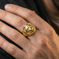 Load image into Gallery viewer, Gold plated raccoon head signet ring worn on finger, premium styling, statement animal ring as focal point on hand
