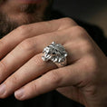 Load image into Gallery viewer, Polished silver angry lion king ring worn on finger, lifestyle hand shot, crisp mane engraving and strong metal shine
