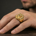 Load image into Gallery viewer, Gold plated ram head signet ring worn on finger, premium lifestyle framing, statement animal signet ring focal detail

