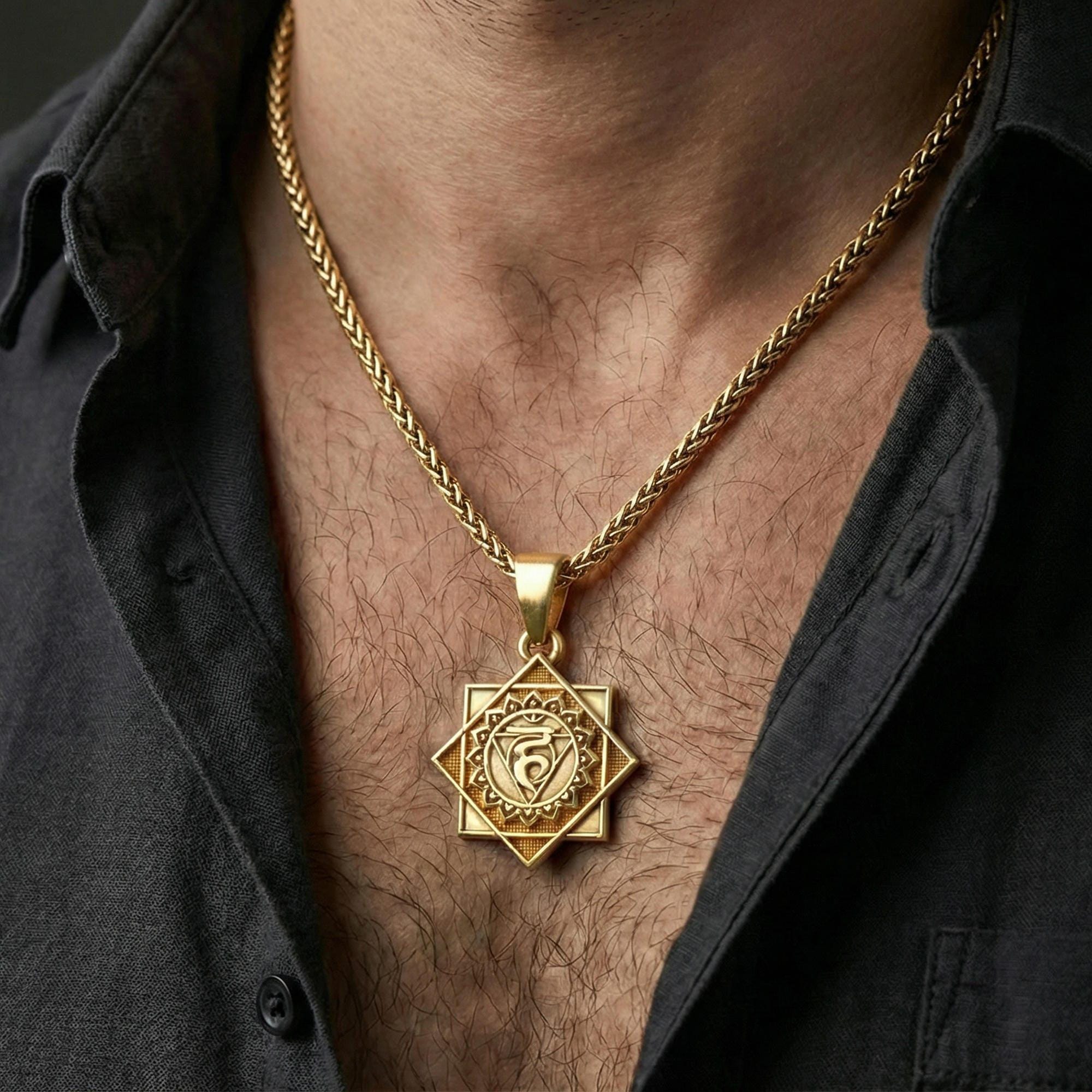 Gold plated Throat Chakra necklace pendant worn on neck, close-up lifestyle shot, luxury lighting with refined metallic highlights