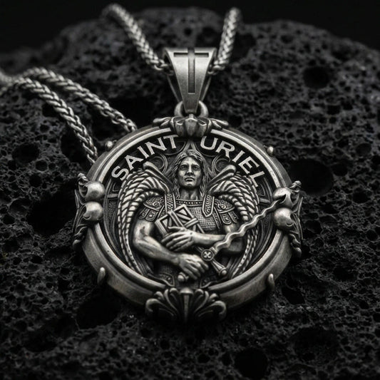 Oxidized Saint Uriel pendant on textured volcanic rock, macro close-up, angel warrior medallion detail, premium studio lighting