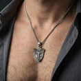 Load image into Gallery viewer, Oxidized Archangel Michael shield pendant necklace worn on neck, lifestyle close-up on dark outfit, shield medallion centered

