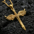 Load image into Gallery viewer, Gold plated Archangel Michael sword pendant displayed on porous volcanic rock surface, close-up studio composition, detailed wings and hilt engraving
