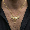 Load image into Gallery viewer, Gold plated Archangel Michael necklace pendant worn on neck, close-up lifestyle shot, luxury lighting with refined metallic highlights
