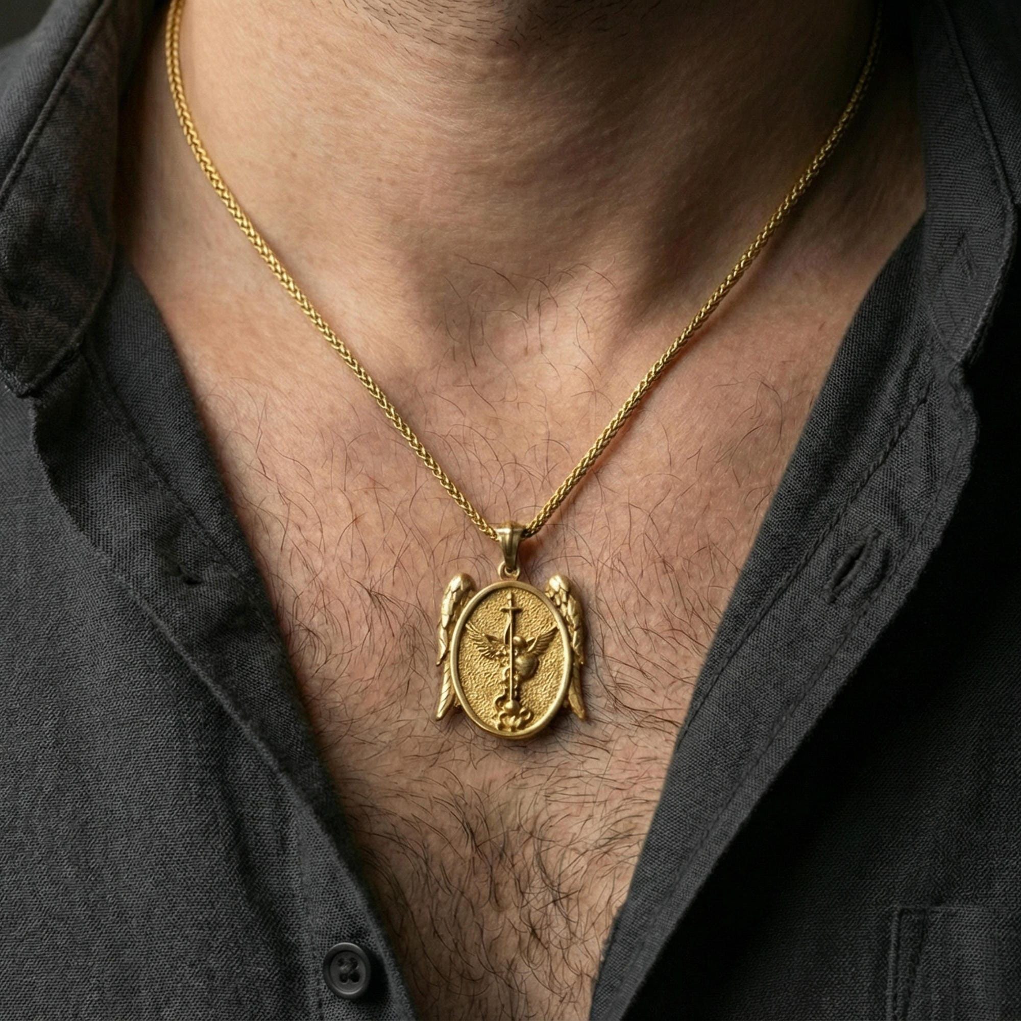 Gold plated Saint Michael necklace pendant worn on neck, close-up lifestyle shot, luxury lighting with refined metallic highlights