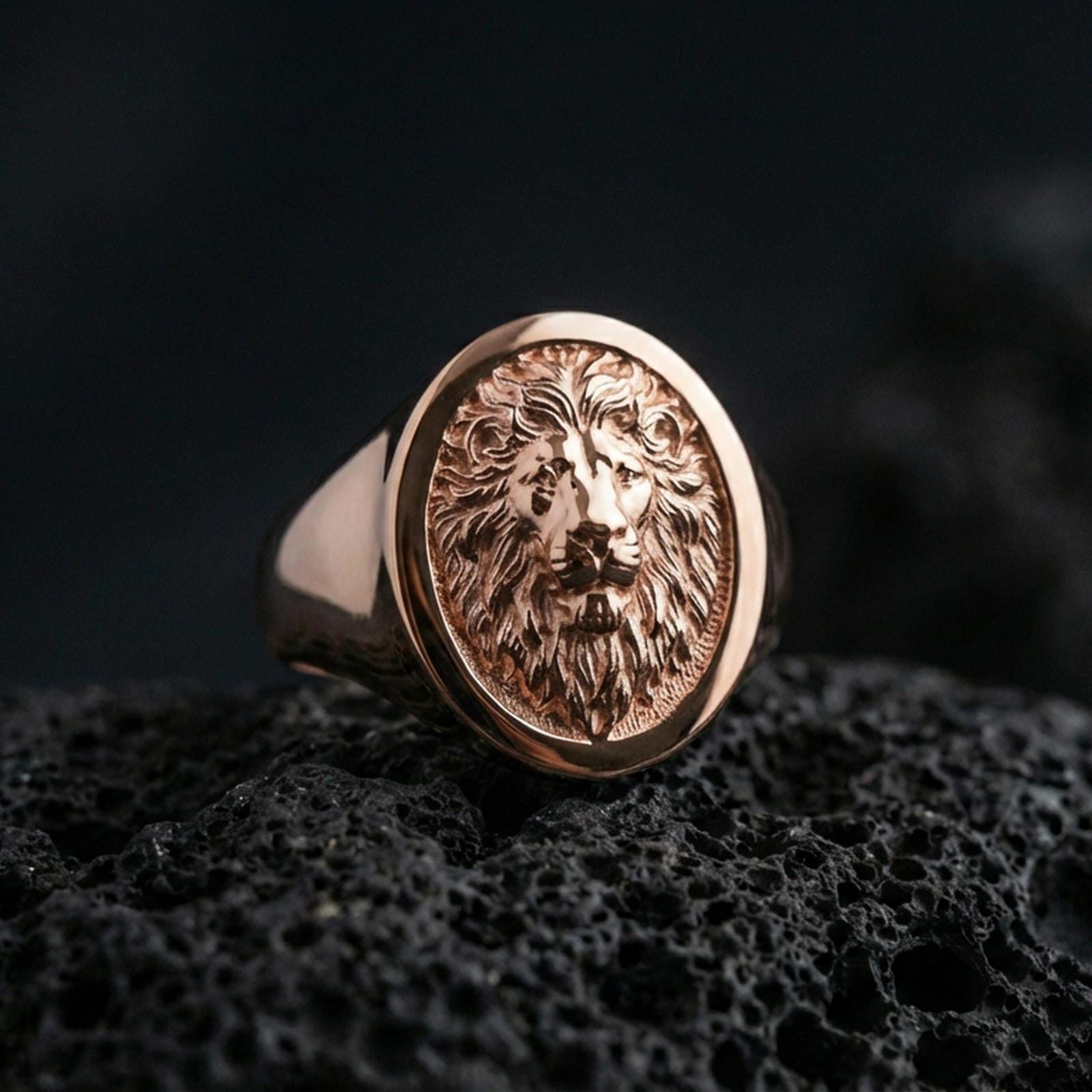 925 sterling silver lion head signet ring on volcanic stone, rose gold plated finish with detailed mane and antique style contrast