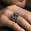 Load image into Gallery viewer, Oxidized ram signet ring worn on finger, masculine biker style ring lifestyle shot
