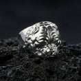 Load image into Gallery viewer, Polished silver bulldog ring on volcanic rock surface, close-up highlighting the sculpted dog face, strong jawline, and clean band profile
