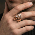 Load image into Gallery viewer, Rose gold plated gorilla head ring on a finger, macro view showing the detailed roar expression and contours
