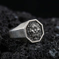 Load image into Gallery viewer, Octagon sterling silver oxidized Foo Dog signet ring on volcanic rock, Chinese guardian lion face relief, macro studio product shot
