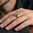 Load image into Gallery viewer, Oni skull ring in a rose gold plated finish on finger, detailed horned yokai mask profile, lifestyle wear photo

