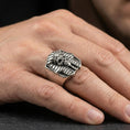 Load image into Gallery viewer, Sterling silver pharaoh skull ring in an oxidized finish worn on finger, Egyptian skull headdress detail visible, lifestyle hand close-up
