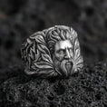 Load image into Gallery viewer, Zeus sterling silver ring with Greek god portrait and laurel details on volcanic rock, oxidized finish macro photo
