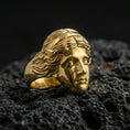 Load image into Gallery viewer, Gold plated Venus goddess ring inspired by ancient Greek sculpture, refined face relief, premium studio macro on black volcanic rock surface
